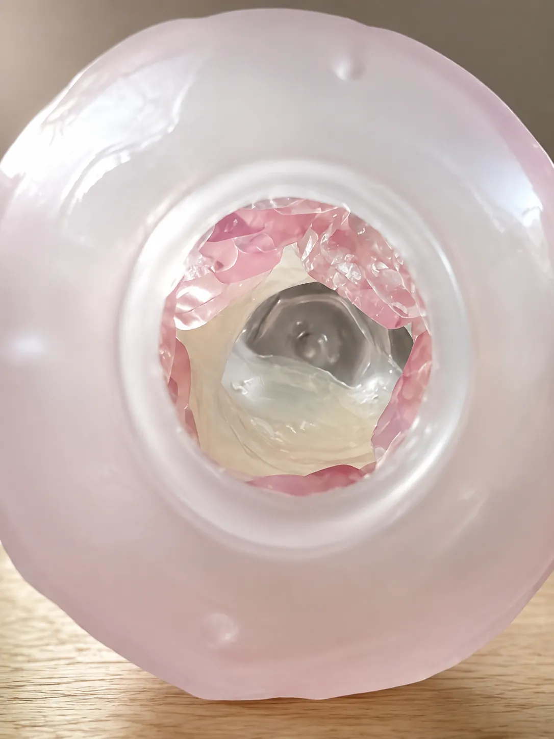 Close-up view inside a TENGA Spinner sleeve showing the internal texture.