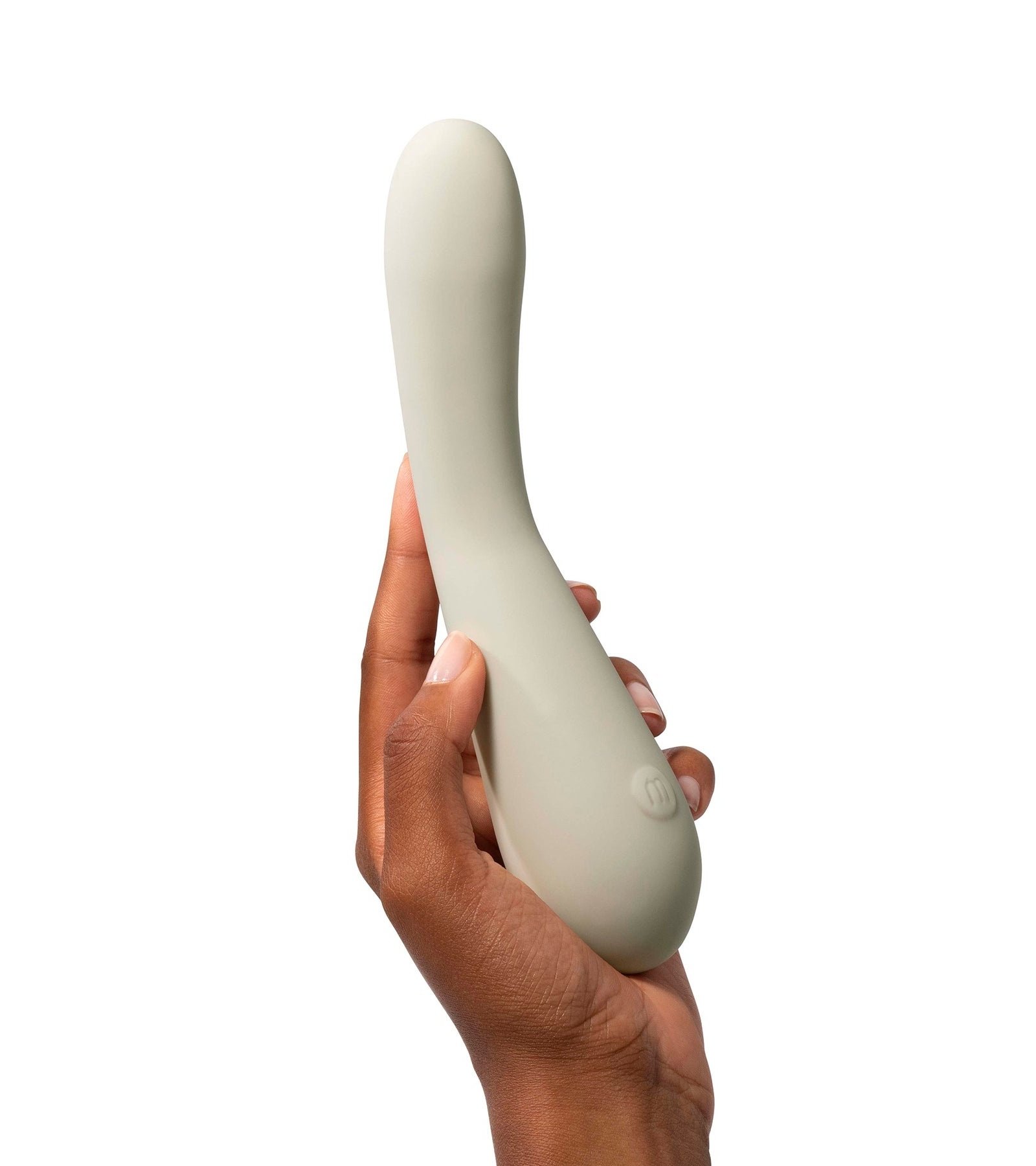 Authentic photograph of a human hand holding the 8.31-inch Maude Spot vibrator, showing its true ergonomic curve and debossed logo control button