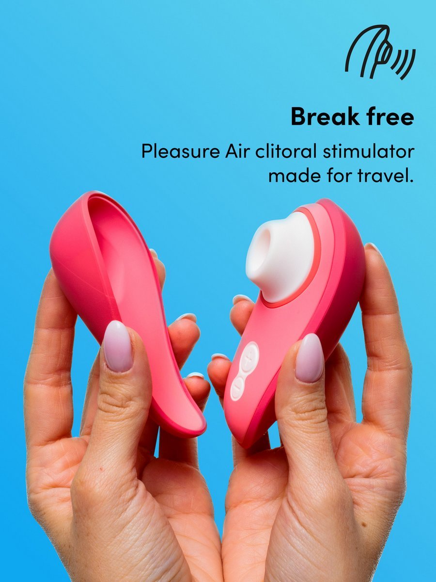 Close-up product photograph showing the Womanizer Liberty 2 with its magnetic travel cap removed to reveal the silicone stimulation nozzle